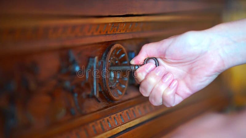 Skeleton key going into old keyhole lock