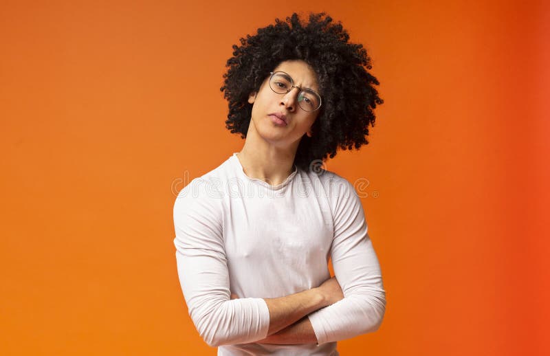 Skeptical Black Millennial Man, Looking Suspiciously at Camera Stock