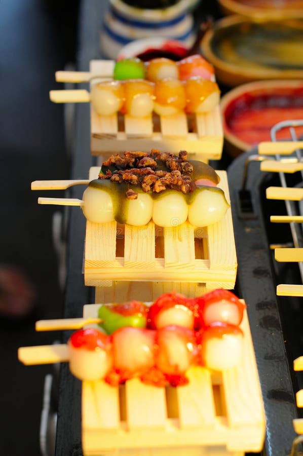 Skewered Rice Cake Balls with Toppings stock images