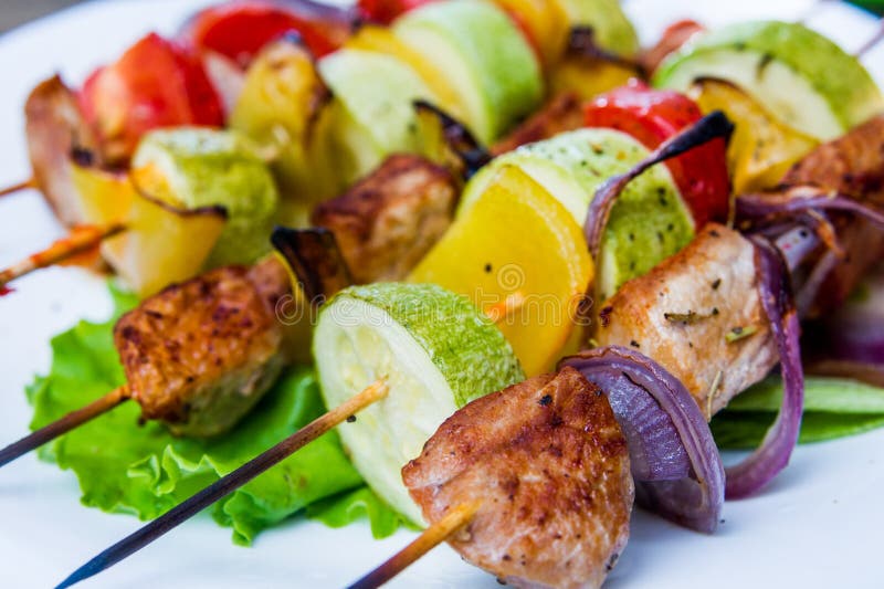 Skewers of meat and fresh vegetables