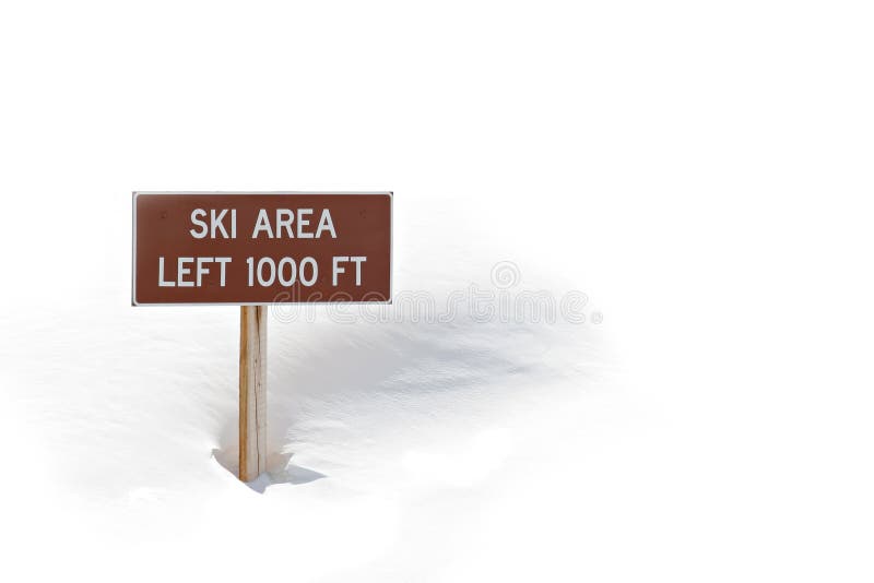 Ski area sign in snow