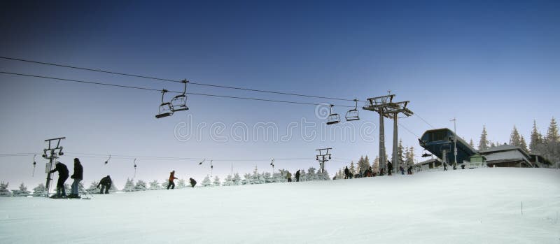 Ski lift chairs and ski slope
