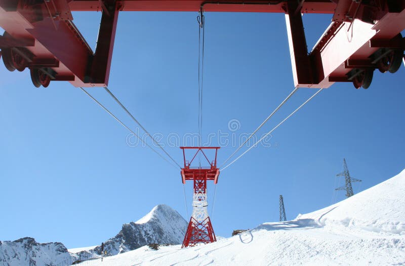 Ski lift on snowy mountain stock photo. Image of transportation 14146800