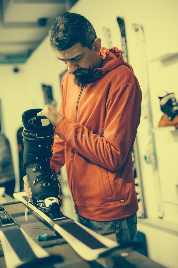 Ski Repair Shop Worker Adjust the Bindings Stock Photo Image of