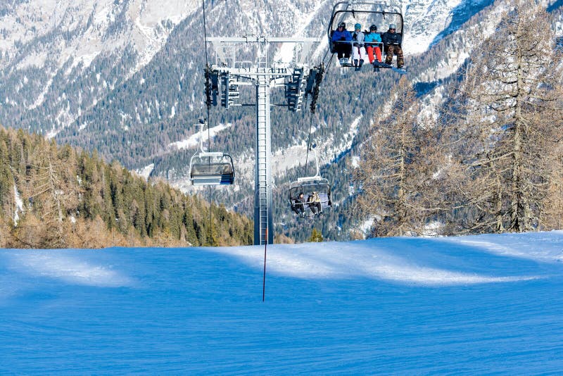 Ski resort Folgarida Marilleva.Folgarida Marilleva.Italy.15.02.2019. People rise on a chair lift