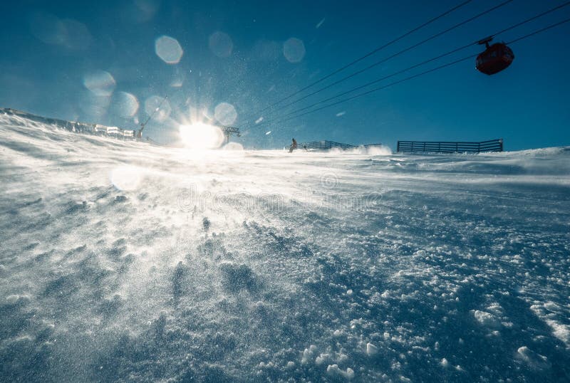 Ski resort snow hill in bright sunny light