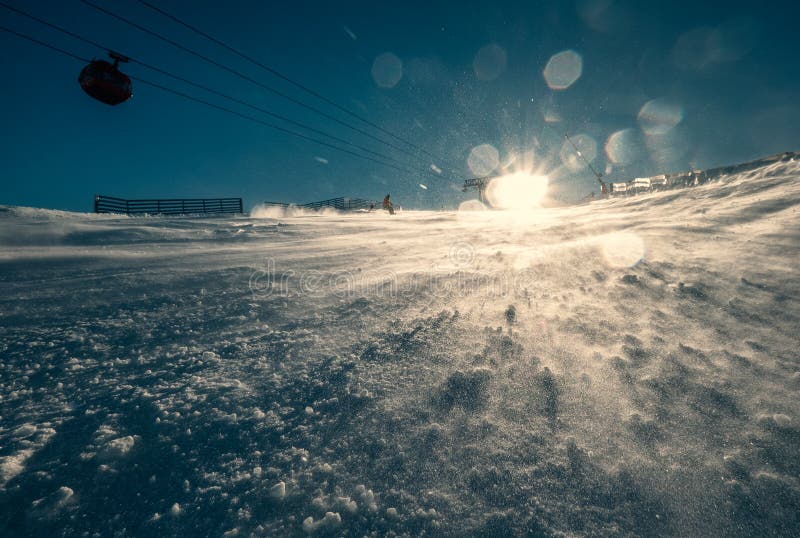 Ski resort snow hill in bright sunny light