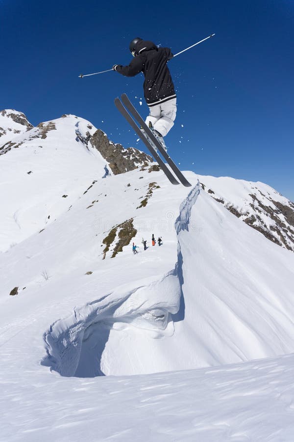 Ski Rider Jumping on Mountains. Extreme Freeride Sport. Stock Image