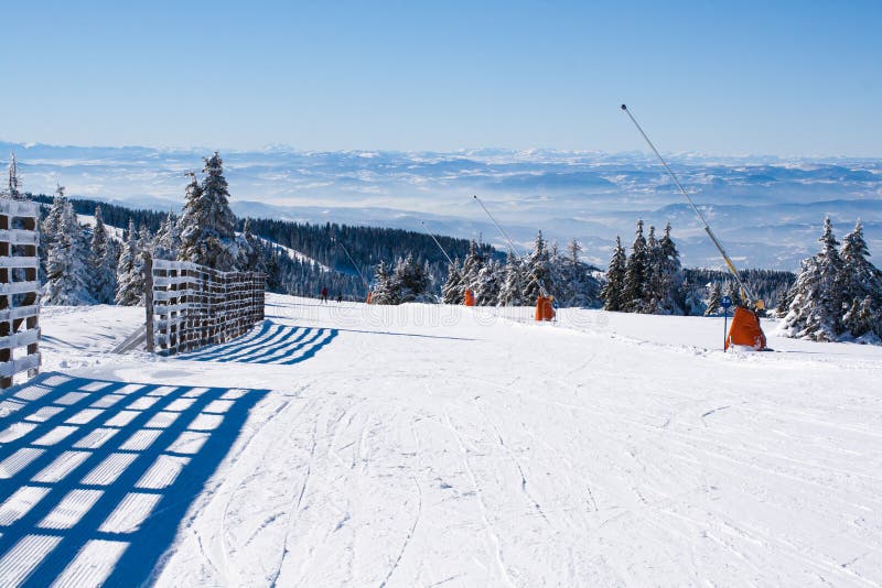 Ski Slope, People Skiing Down the Hill, Mountains View Editorial