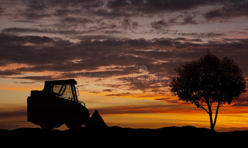 Skid loader and a single tree