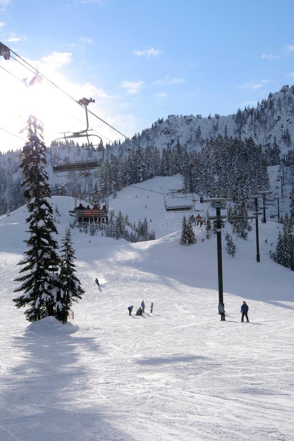 Snow slopes with skiers and lifts. Snow slopes with skiers and lifts