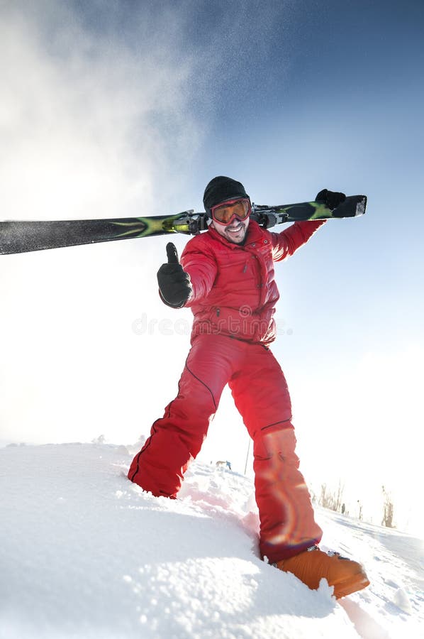 Skier showing thumbs up royalty free stock image