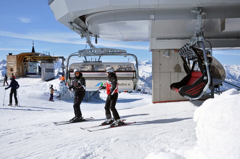 Skiers Going Up with Ski Lift Editorial Photography - Image of alps ...