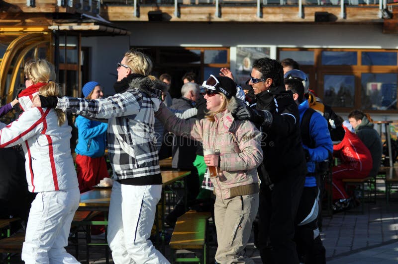Skiers at a party in the Austrian Alps