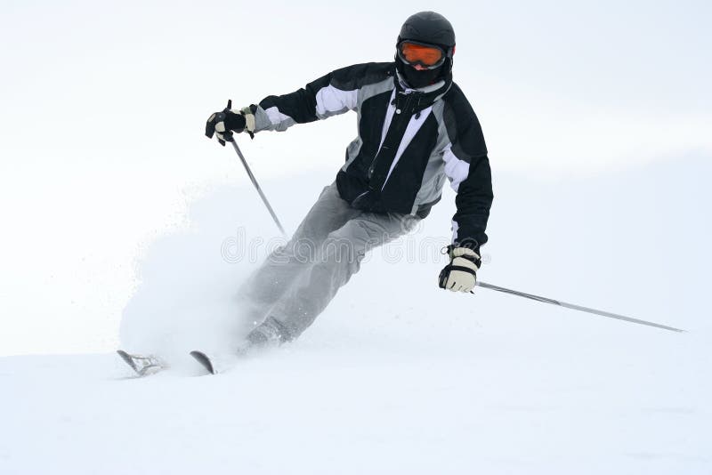 Skier on sliding down a slope. Skier on sliding down a slope