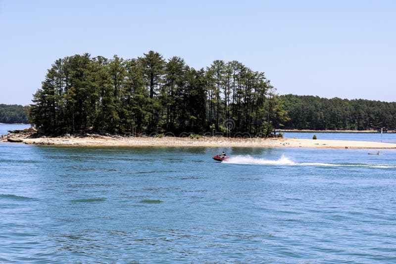Skiing in the Lake lanier stock image. Image of river 113101149