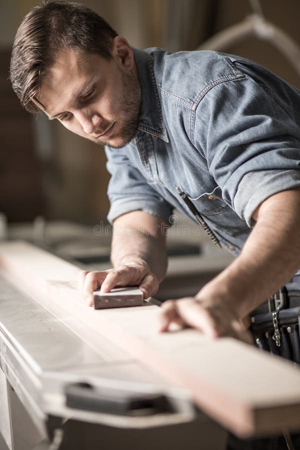 Skilled carpenter working royalty free stock photo