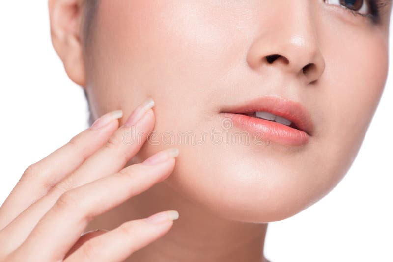 Skin care. Beautiful Young Asian Woman with Clean Fresh Skin touch her face royalty free stock photo Skin care. Beautiful Young Asian Woman with Clean Fresh Skin touch her face royalty free stock photo