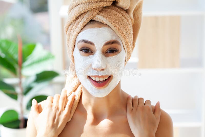 Skin Care, Woman with Beautiful Facial Skin Applying Mask on Face Stock ...