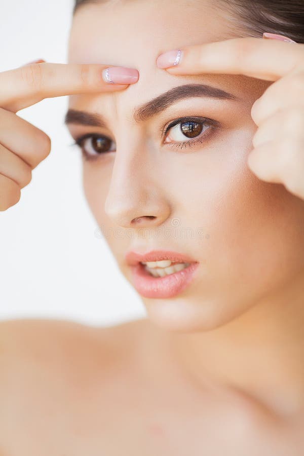 Skin Care. Young Woman Try To Remove Her Pimple Stock Image - Image of