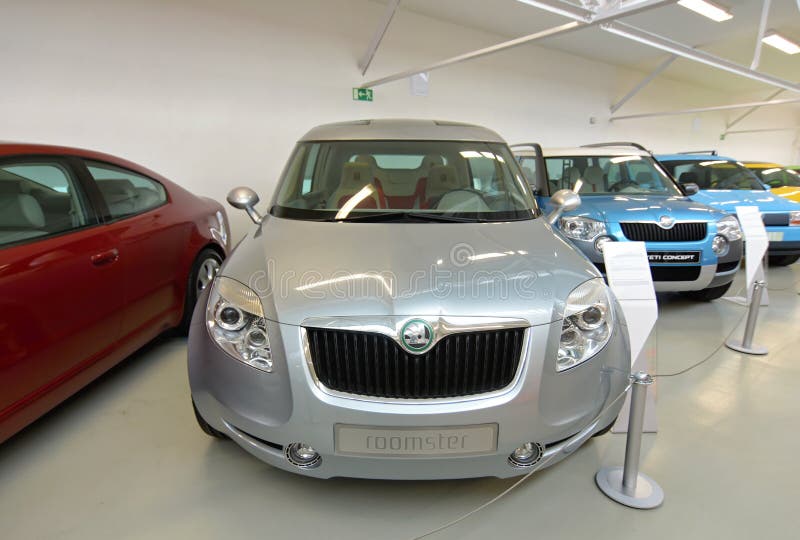 dpa) - Groups of visitors look at the Skoda Roomster at the stand of Skoda  during the IAA international car show in Frankfurt Main, Germany, 9  September 2003. This prototype of a