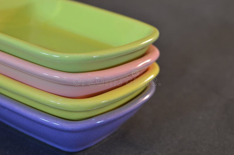 Stack of colorful plastic 4 bowls. Stack of colorful plastic 4 bowls