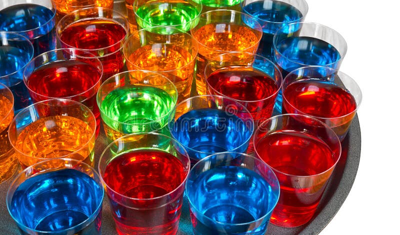 Various alcoholic shots in shot glasses in a serving tray often used for offers in the drinks industry. Various alcoholic shots in shot glasses in a serving tray often used for offers in the drinks industry