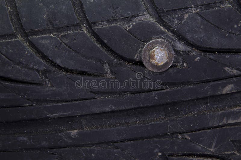Skrew stuck in a tire stock photo. Image of tires, steel 50956276