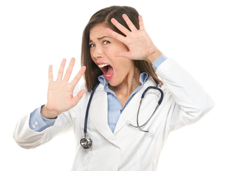 Screaming scared doctor woman afraid and frightened covering her face with hands showing funny expression shocked and surprised. Female medical health care professional isolated on white. Screaming scared doctor woman afraid and frightened covering her face with hands showing funny expression shocked and surprised. Female medical health care professional isolated on white.