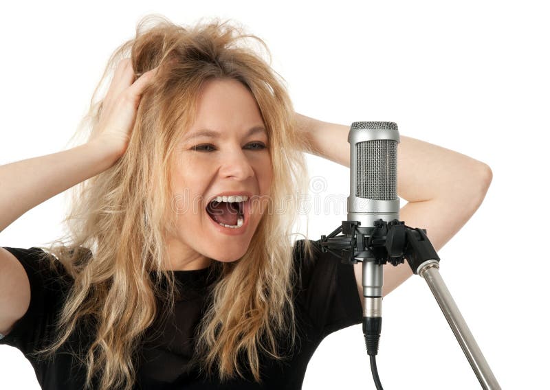 Female rock singer screaming to the microphone. Isolated on white background. Female rock singer screaming to the microphone. Isolated on white background.