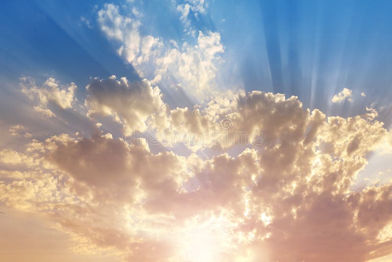 Sky with Gray and Blue Clouds and Redorange Highlight from the Sun