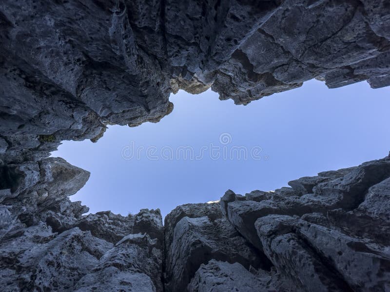Sky and silence in dangerous and wild caves royalty free stock photo