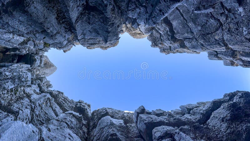 Sky and silence in dangerous and wild caves royalty free stock photos