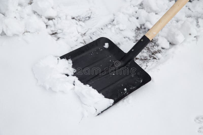 Skyffel som gör ren snö royaltyfria bilder Skyffel som gör ren snö royaltyfria bilder