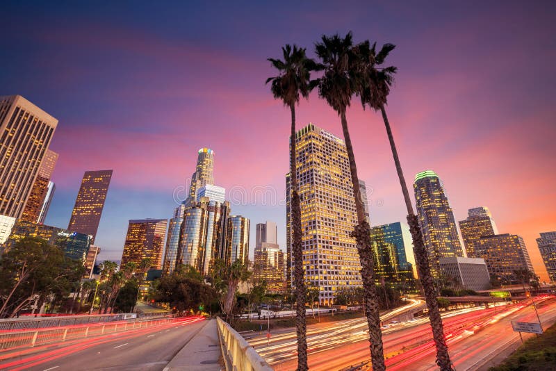 Downtown Los Angeles skyline during rush hour at sunset. Downtown Los Angeles skyline during rush hour at sunset