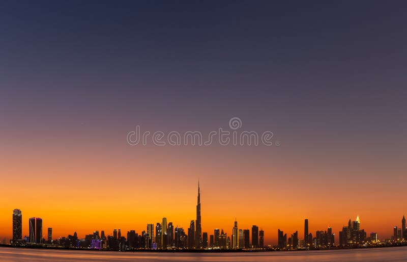 Skyline Of Dubai Business Bay With Burj Khalifa After Sunset With