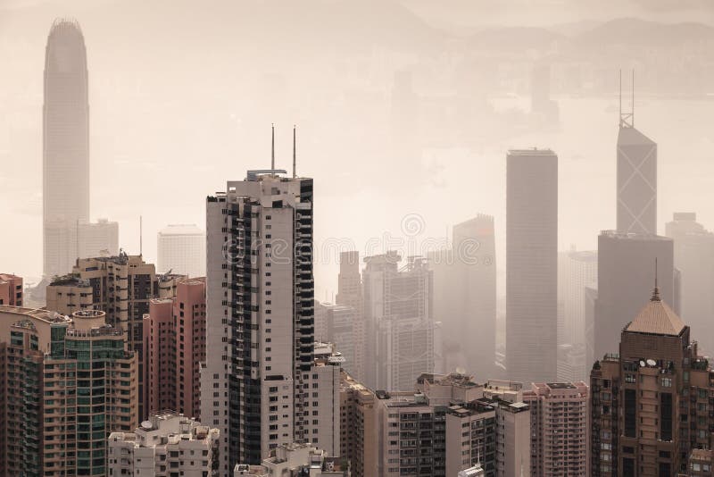 Skyline of Hong Kong city in foggy day stock photos Skyline of Hong Kong city in foggy day stock photos