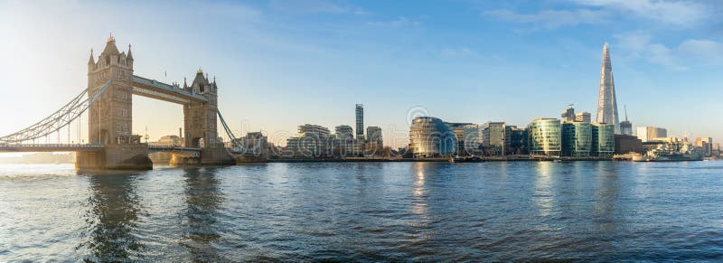 The iconic urban skyline of London, UK, during a sunny morning: from the Tower Bridge to London Bridge. The iconic urban skyline of London, UK, during a sunny morning: from the Tower Bridge to London Bridge