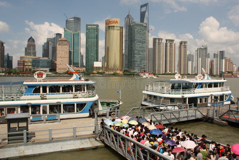 Skyline of Shanghai and tourist boats
