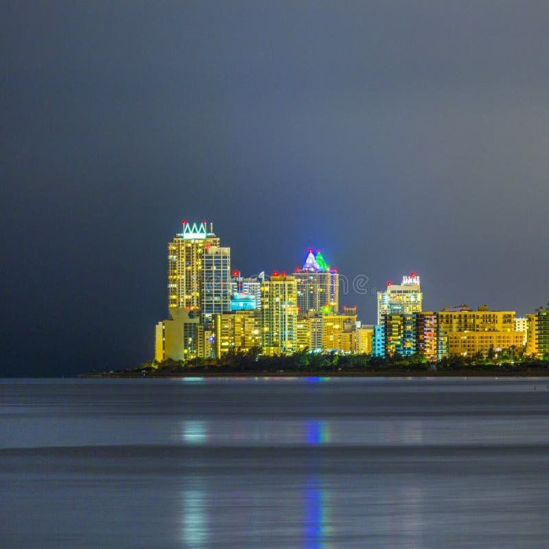 Skyline of Sunny Isles Beach by Night with Reflections at the Surface