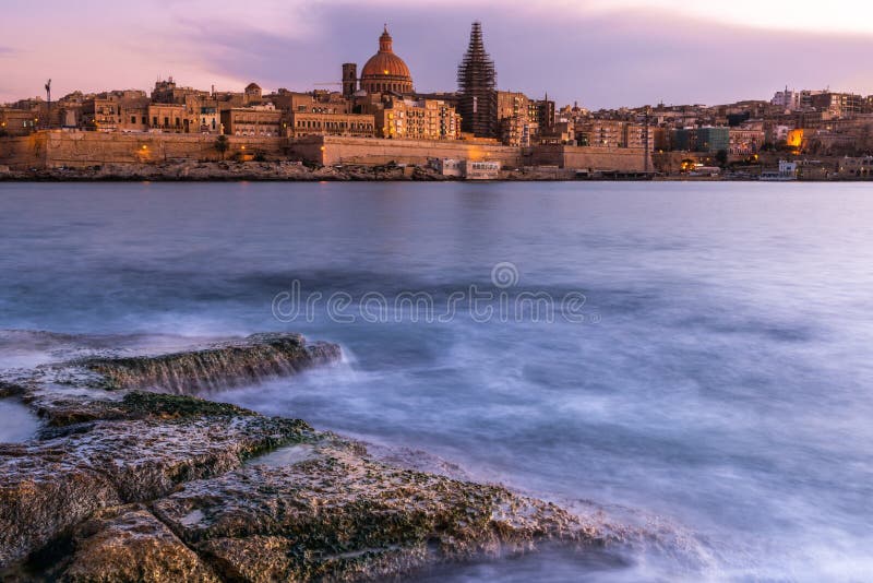 Skyline of Valletta, Malta at Pink Warm Sunset Stock Photo Image of