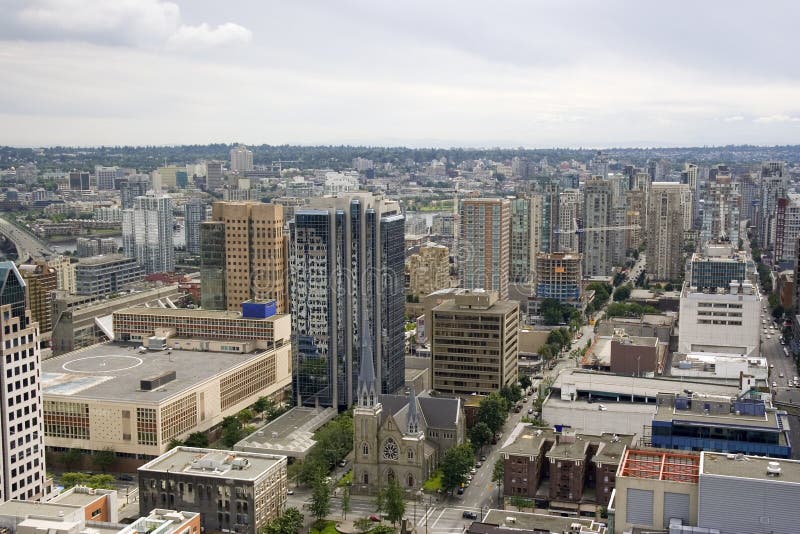 Skyline of Vancouver - ancient church and new skyscrapers stock images
