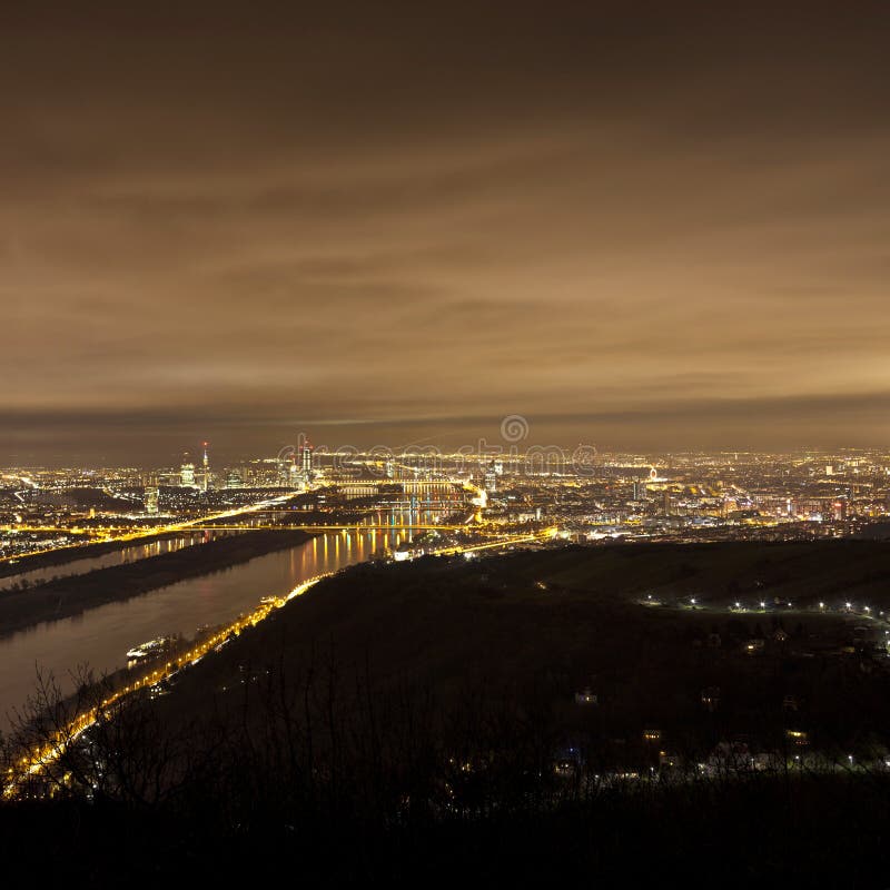Skyline of Vienna and Danube at night - Viewpoint Leopoldsberg royalty free stock photography