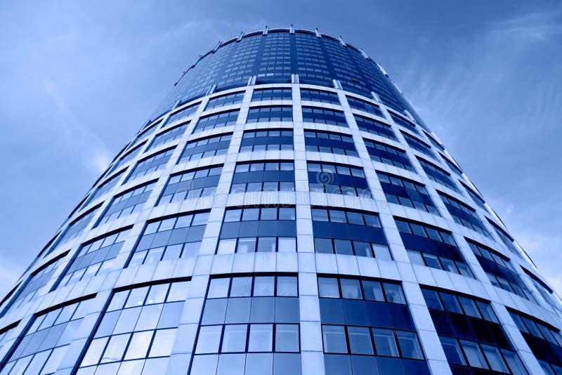 Modern skyscraper toned in blue color. Window color reflection background stock images, royalty-free photos and pictures