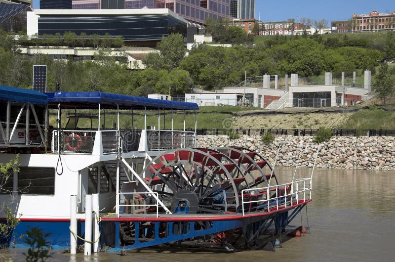 Skyscrapers and river boat