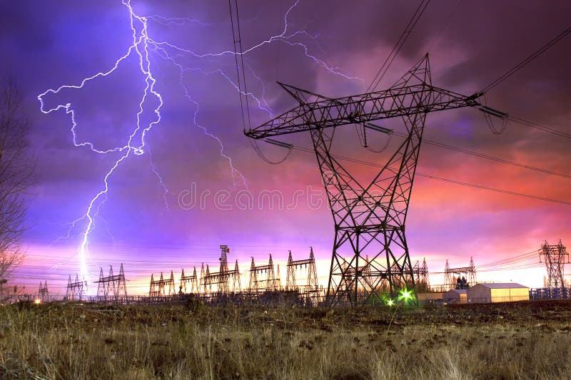 Dramatic Image of Power Distribution Station with Lightning Striking Electricity Towers. Dramatic Image of Power Distribution Station with Lightning Striking Electricity Towers.