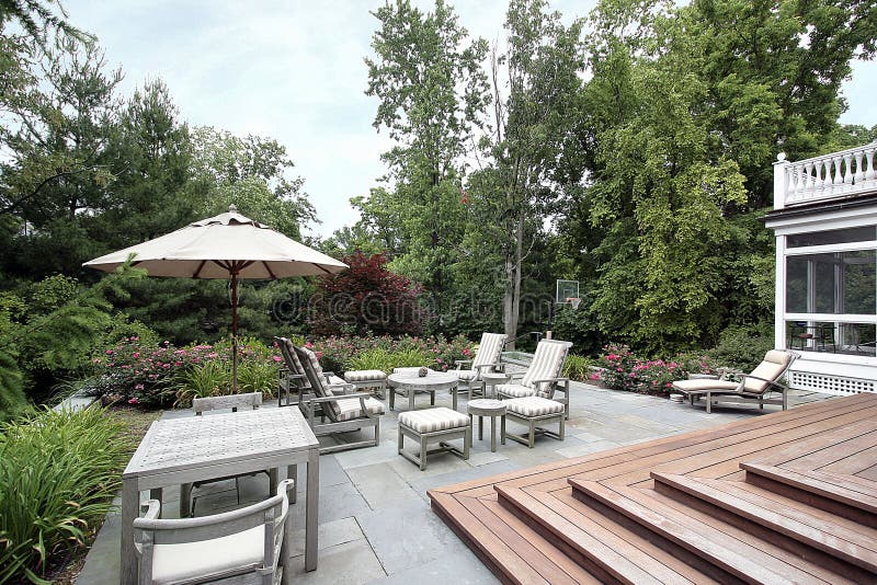 Slate patio with wooden stairs