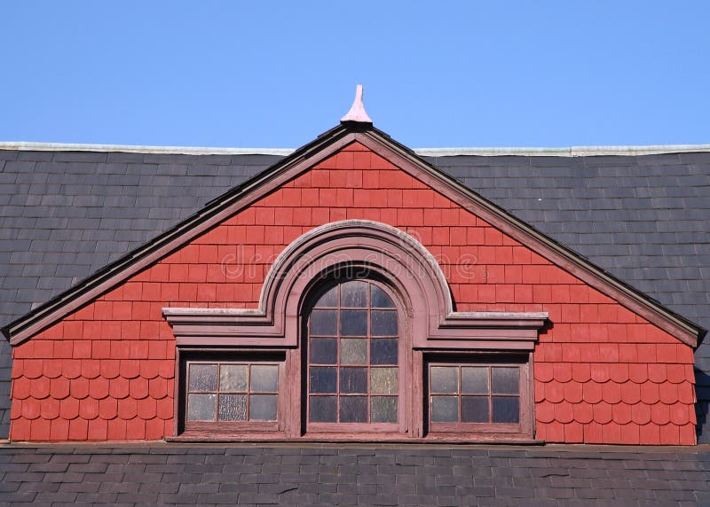 Slate Roof and Red Gable stock image Slate Roof and Red Gable stock image