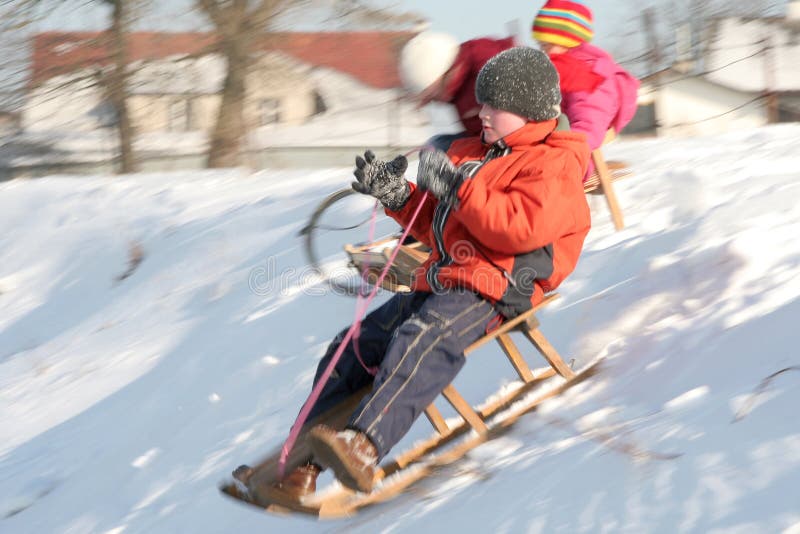 Sledding lizenzfreie stockfotografie Sledding lizenzfreie stockfotografie