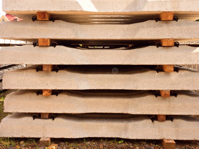 Sleepers stock in railway depot. Concrete railway ties stored for reconstruction royalty free stock photo Sleepers stock in railway depot. Concrete railway ties stored for reconstruction royalty free stock photo